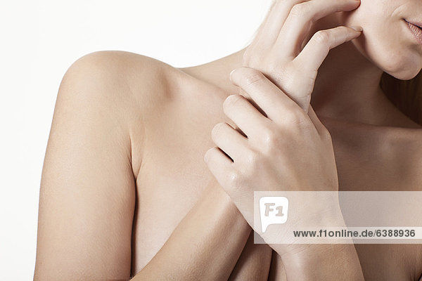 Close up of nude womans hands