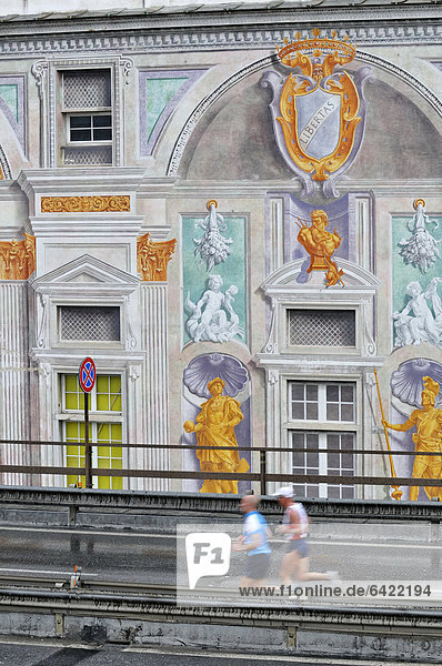 Italy  Liguria  Genoa  people running marathon on Sopraelevata in front of San Giorgio Palace