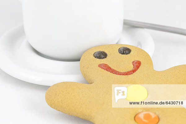 Gingerbread man with coffee cup