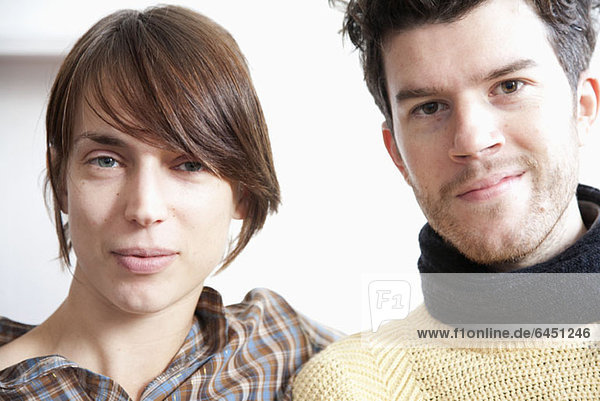 A young couple side by side  close-up