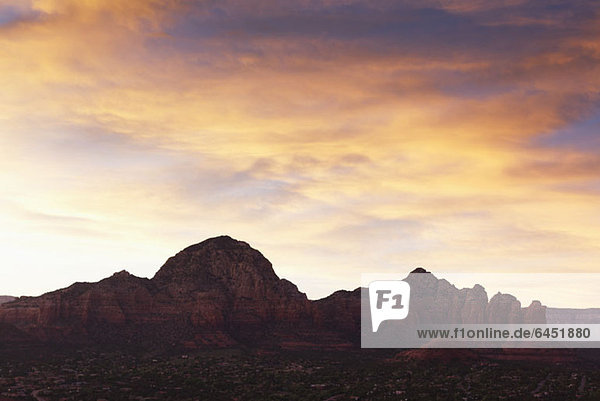 View of rock formations in a desert at sunset  Sedona  Arizona  USA