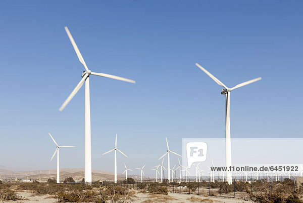 Wind turbines in a desert landscape