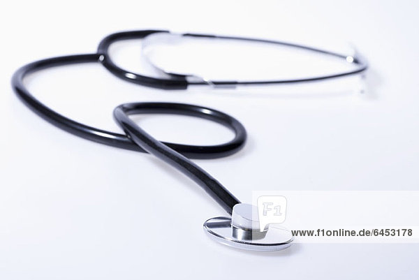 A stethoscope on a white background close-up