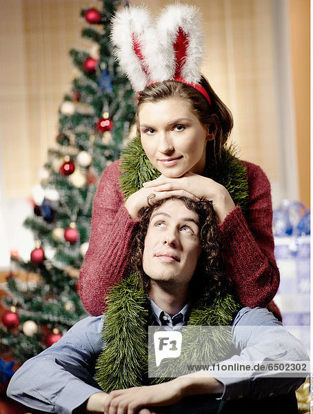 1260342 Portrait of a young couple during Christmas.
