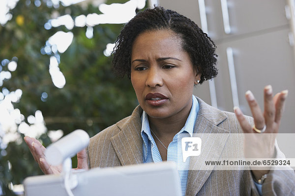 African American businesswoman with laptop