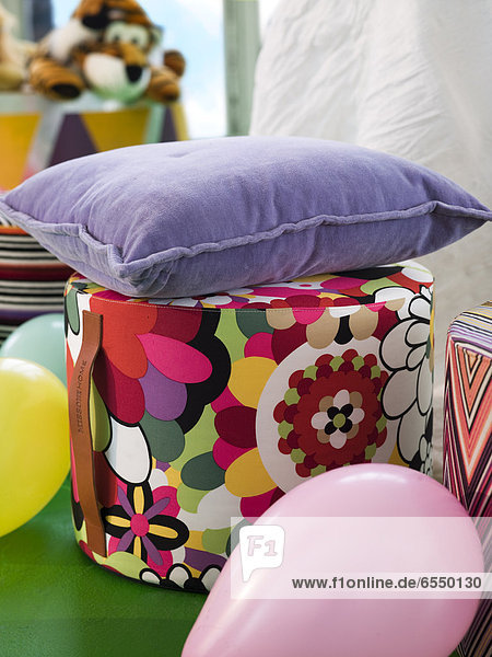 Colorful seat  cushion and balloons