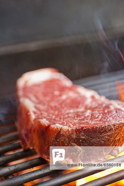 USA  Texas  Grilling rib eye steak  close up