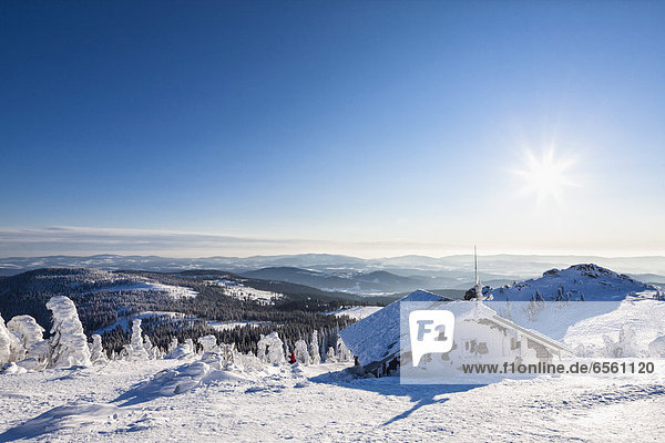 Germany  Bavaria  View of snow covered mountain hut at Bavarian Forest