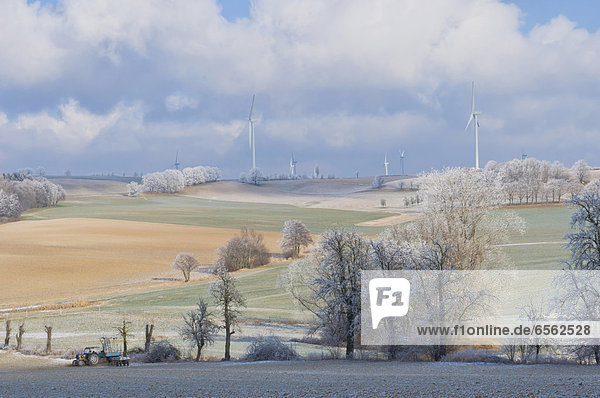 Germany  Saxony  View of wind turbine and rolling landscape