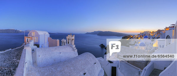 Greece  View of Oia village with bell tower of Greek Orthodox Church at Santorini