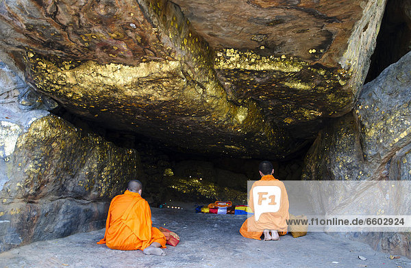 Cave of meditation  covered in gold leaf  on Vulture Peak  important Buddhist pilgrimage destination  Buddha's first place of meditation  Ragir  Rajgir  Rajagriha  Rajagaha  Bihar  India  Asia