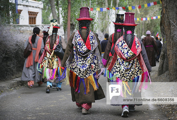 Buddhist Ladakhi Women Wearing Traditional Dress And Hats With Long Platted Hair