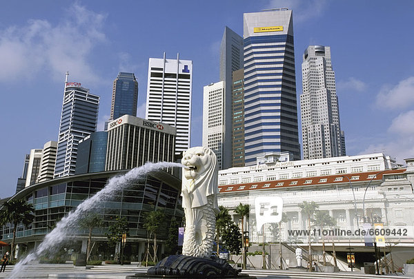 Merlion In Front Of Singapore Business District