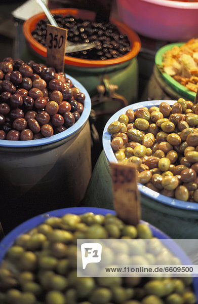 Olives In Jars In A Market  Close Up