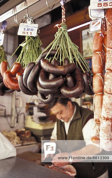 Handmade sausages at market stall
