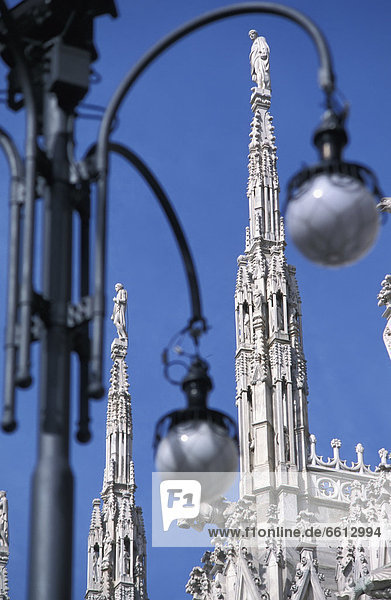 Street light with Duomo Cathedral in background