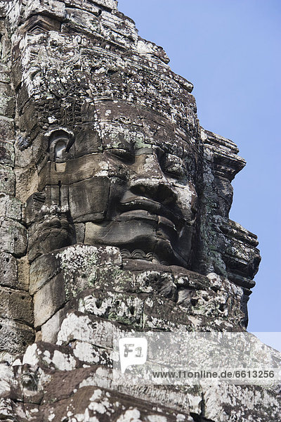 Face of Avalokiteshvara guard from Bayon temple  Angkor Siem Reap Cambodia
