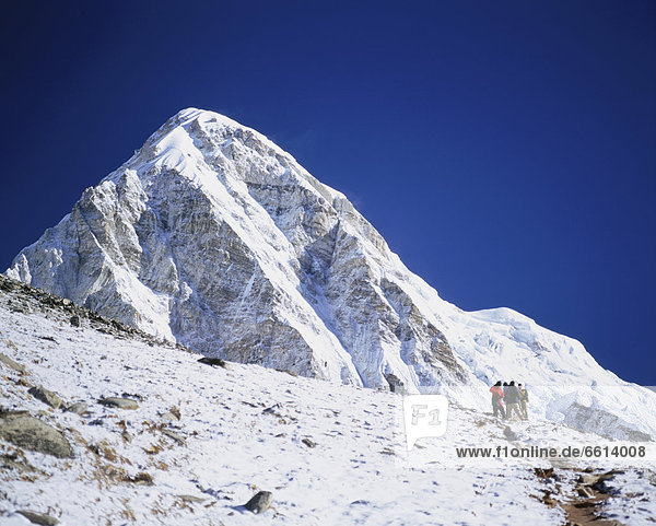 Ascending Kala Patthar (5550 m) for Everest view. Pumo Ri Peak. Everest Base Camp Sagarmatha National Park. Solu Khumu. Nepal.