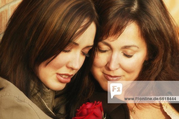 Mother And Daughter Share A Moment