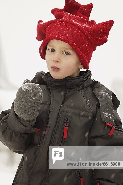 Portrait Of A Child With Red Hat