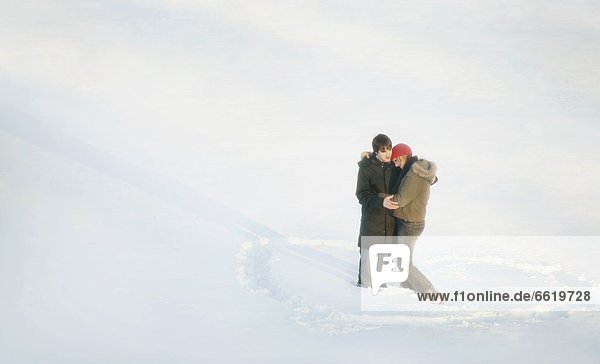 Couple Stand In A Heart