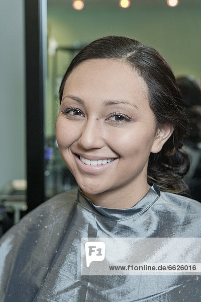 Mixed race woman in salon