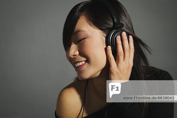 Woman Listening With Headphones