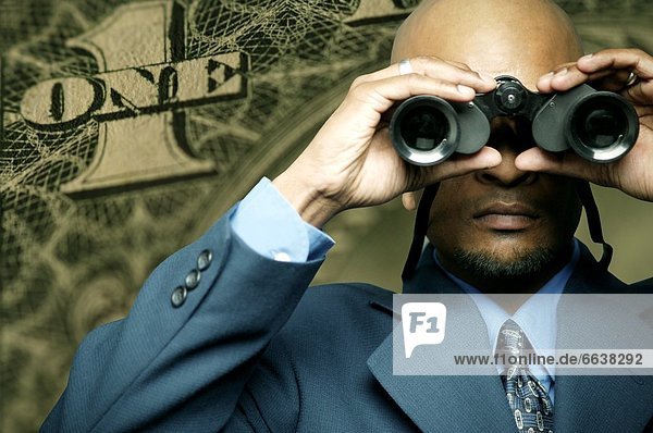 American Dollar Bill And Man With Binoculars