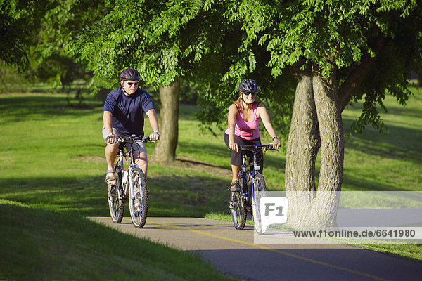 A Couple On A Bike Ride