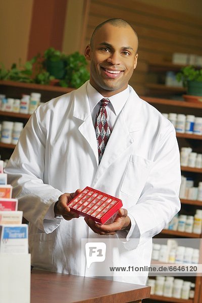 Pharmacist With Medicine