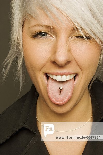 Woman With Tongue Piercing