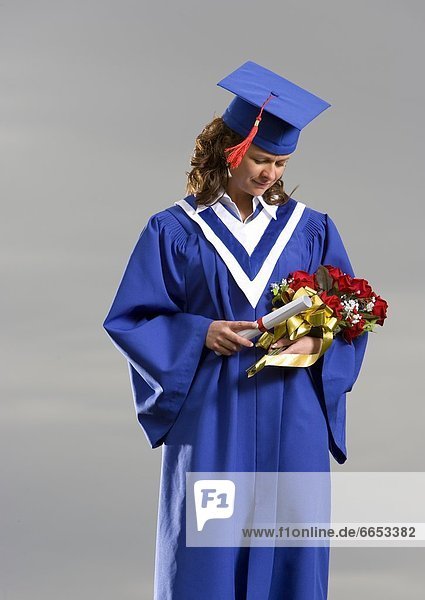 Graduate In Cap And Gown