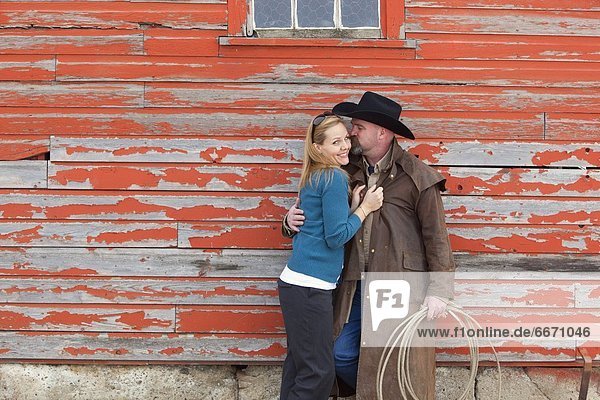 Frau  küssen  Cowboy