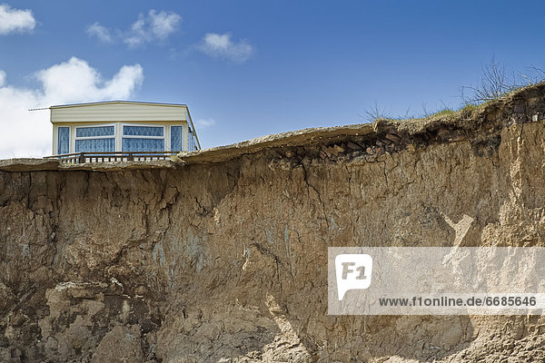 Trailer on Edge of Cliff