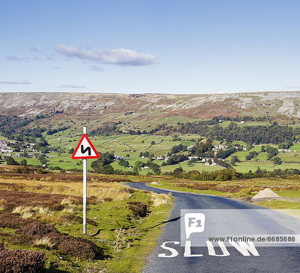 Country Road with Sign