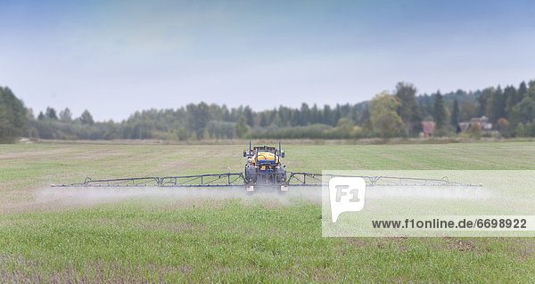 Tractor Spraying Herbicide