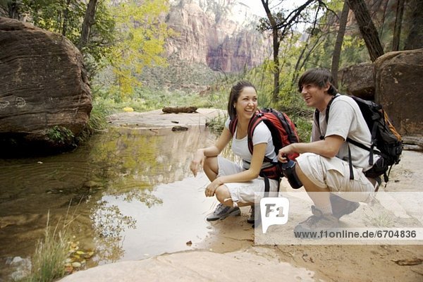 Backpacking couple in Zion National Park Utah USA