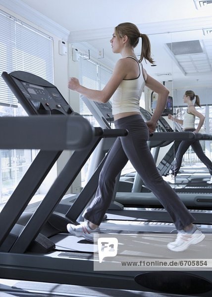 Woman working out on treadmill