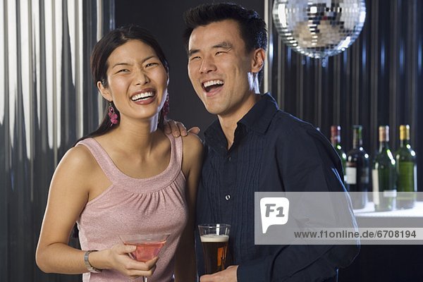 Couple having drinks in a bar