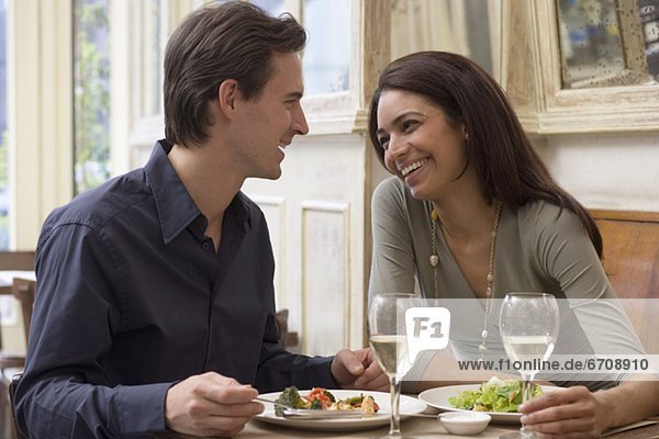 Couple eating at restaurant