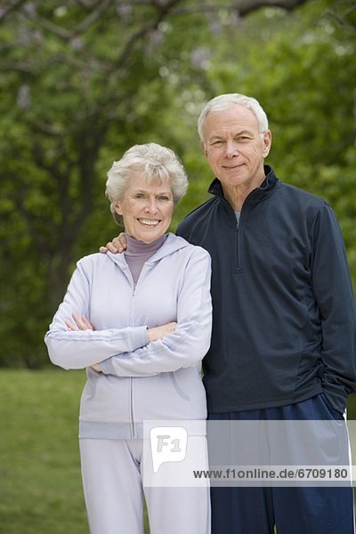 Portrait of senior couple in sweatsuits