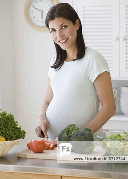 Frau  Gemüse  Schwangerschaft  hacken