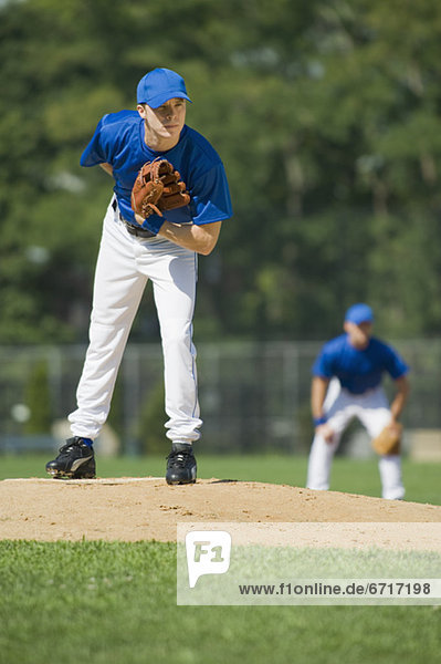 Baseball pitcher, batter and umpire in ready position Stock Photo - Alamy