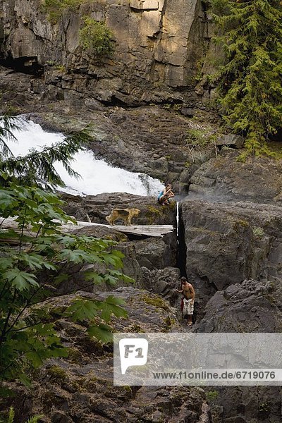 Person By Waterfall  Elk Falls Provincial Park  British Columbia  Canada