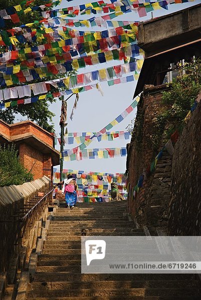 Climbing The Steps To The Swayambhunath Stupa In Kathmandu  Nepal