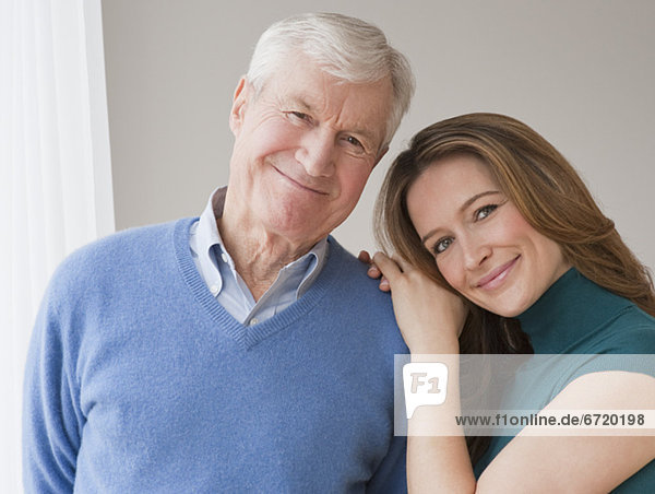 Portrait of senior man and daughter