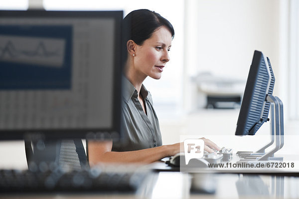 A businesswoman using a computer