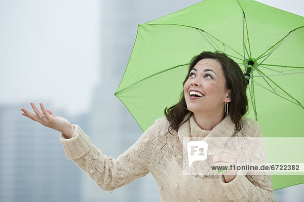 A woman outdoors in the rain