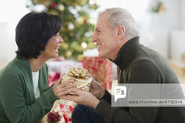 Happy mature couple on christmas time