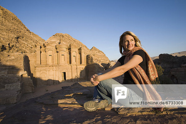 'A Woman Tourist Visits The Nabatean Ruins Of The Monastery